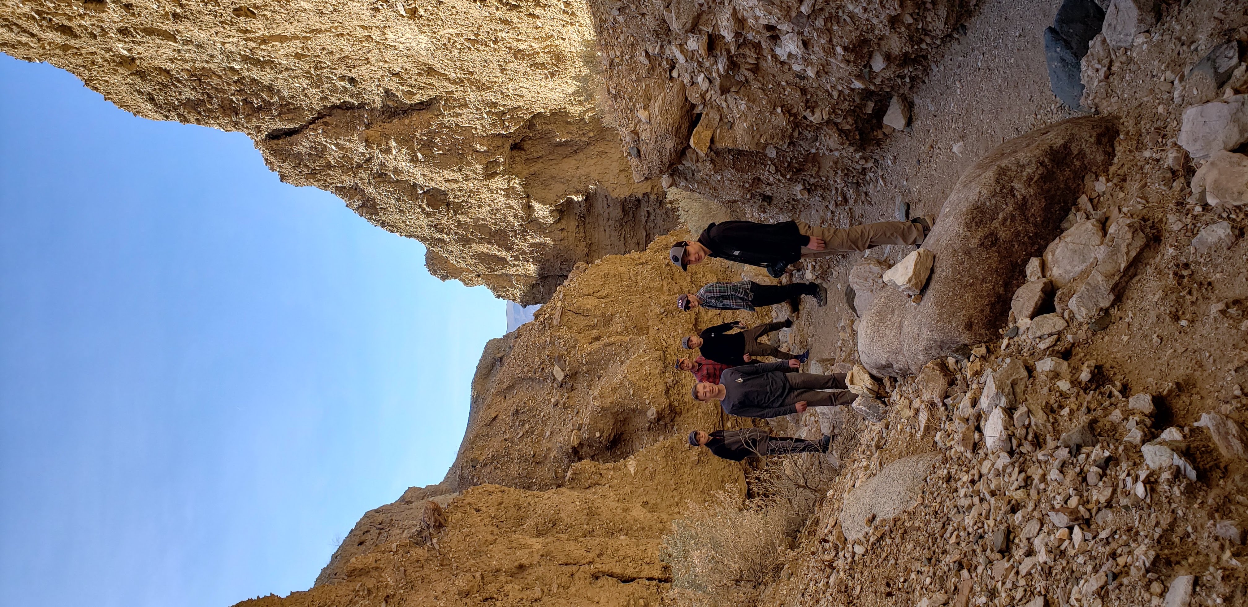 Boys inside a slot canyon.