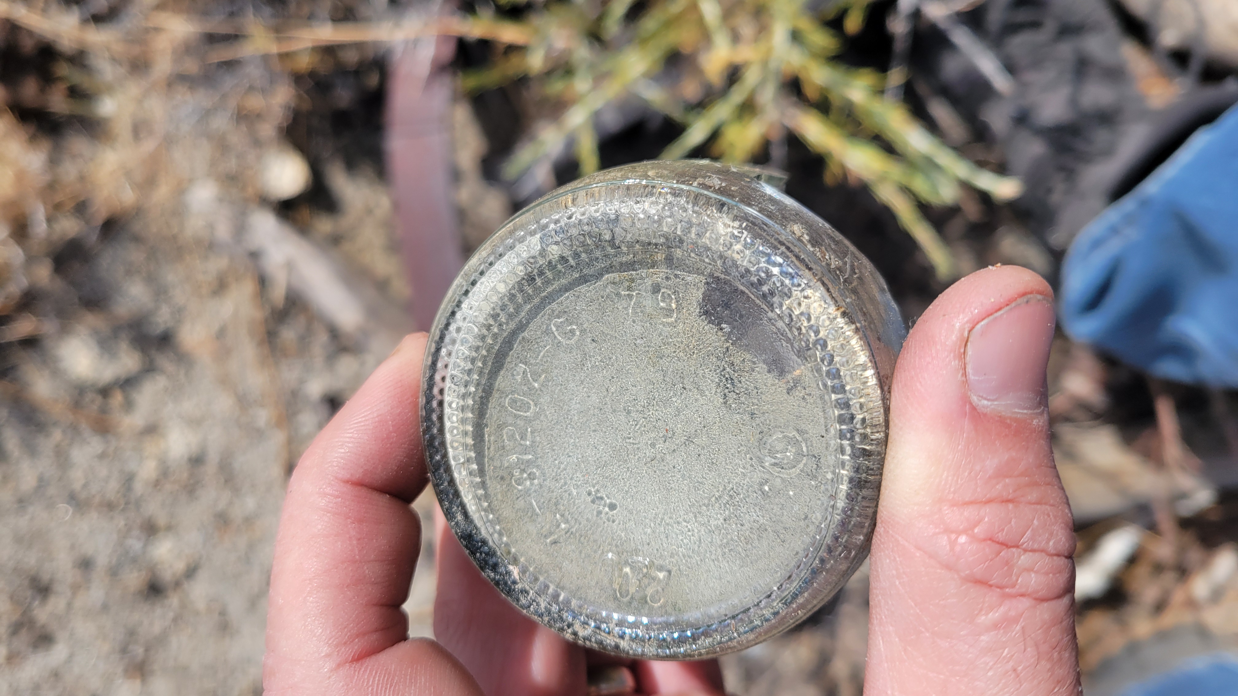 Bottom of a glass bottle.